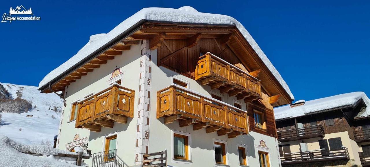 Alpen Royal con giardino e raggiungibile con gli sci ai piedi Aparthotel Livigno Esterno foto
